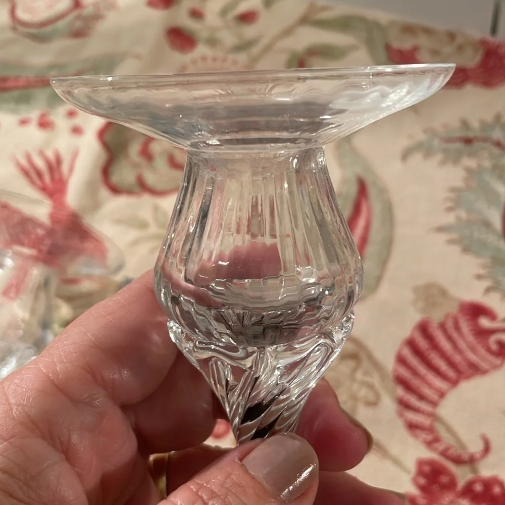 Elegant Handblown Twisted Stem Black Detail Cradling a Ribbed Candle Drip Plate
